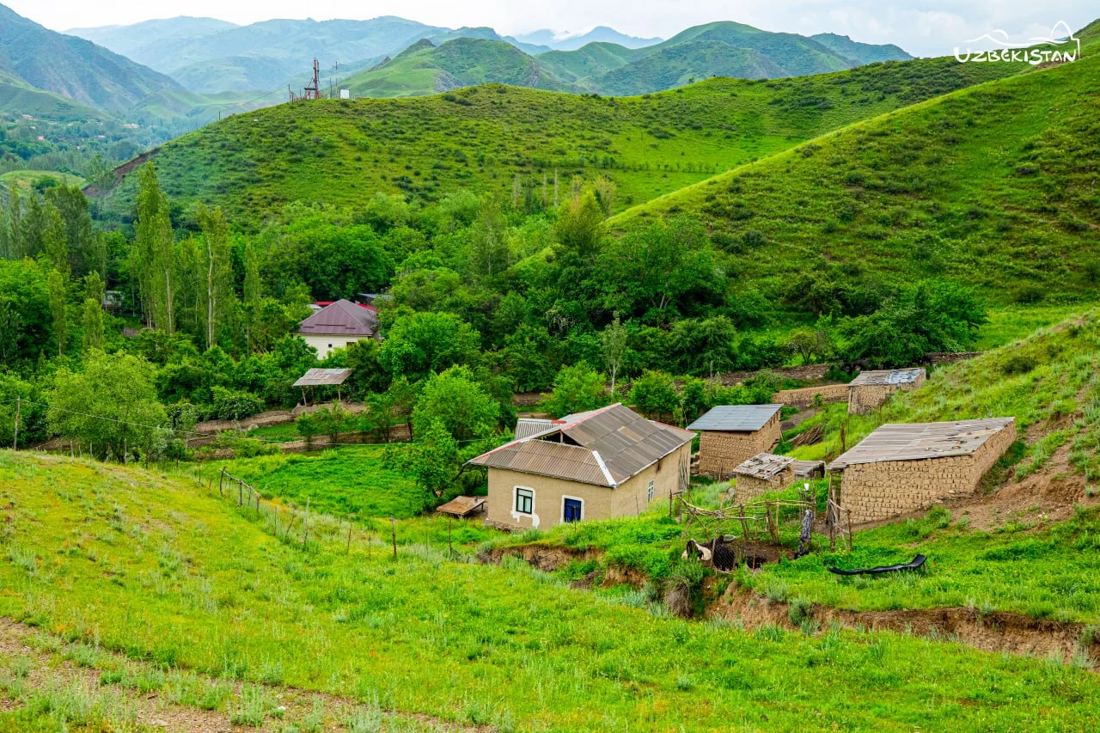 Green hills and a mountain kishlak near Chimgan