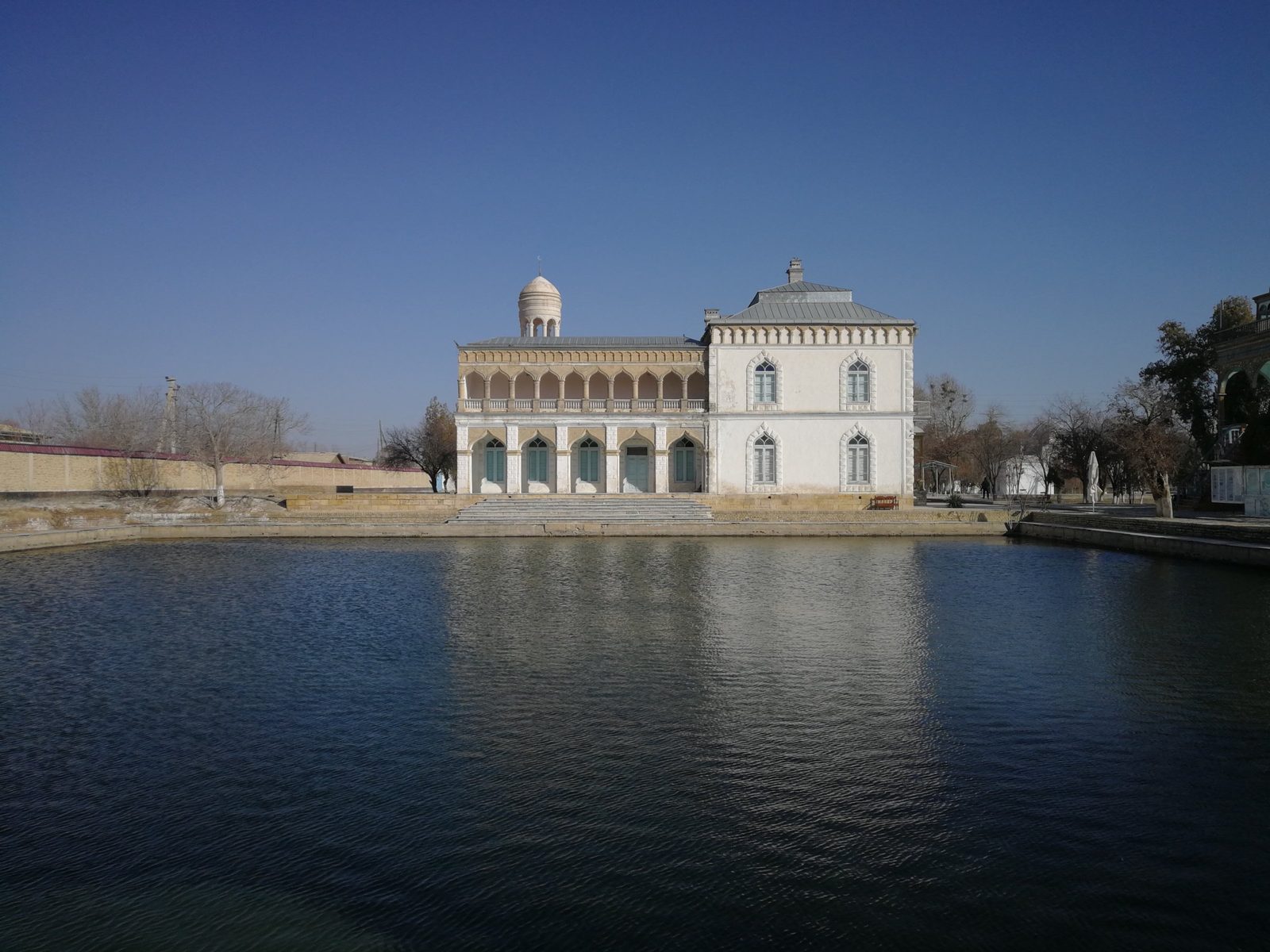 The summer palace of Sitorai Mohi-Hosa across its pond in winter