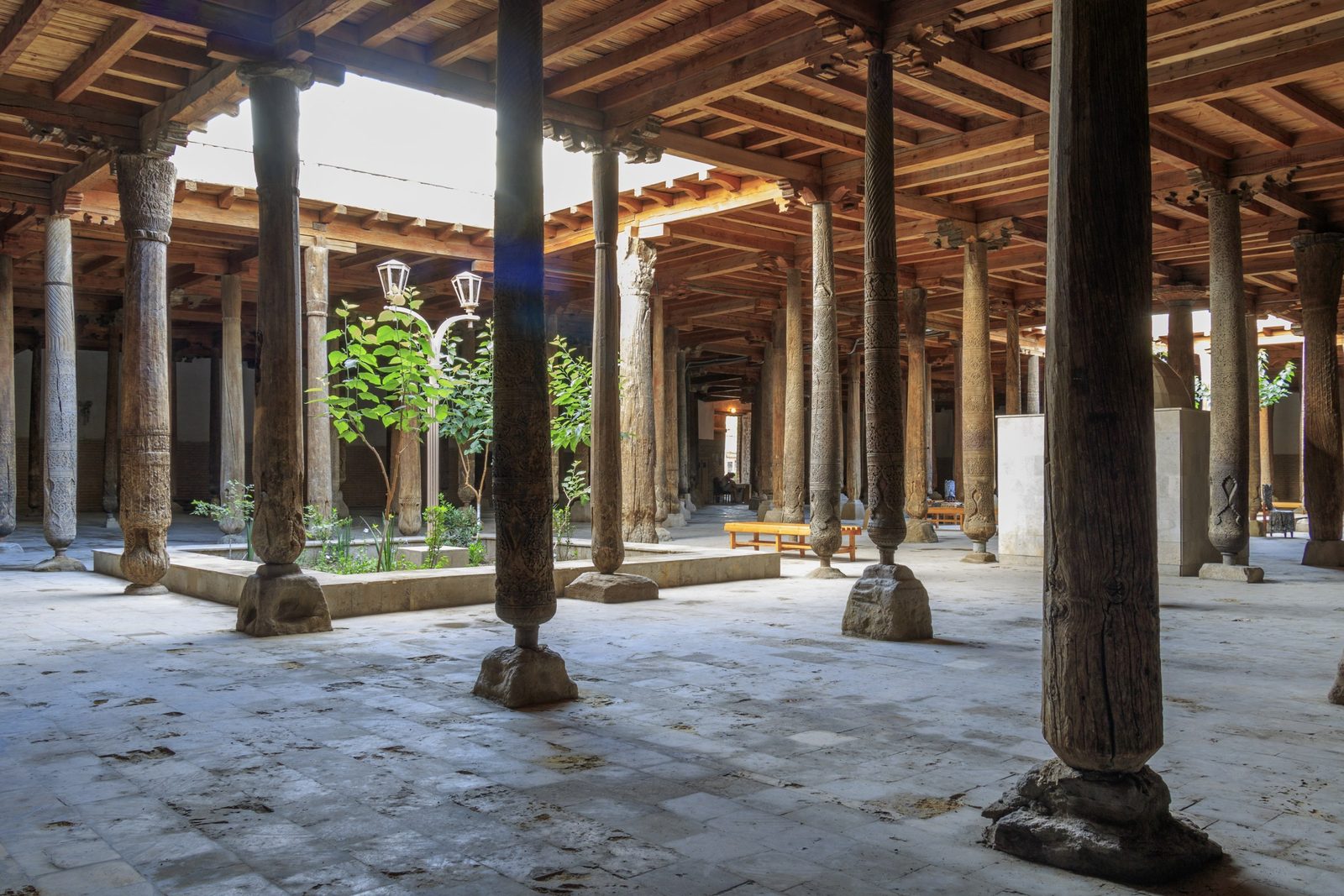 The carved wooden columns of the Juma Mosque