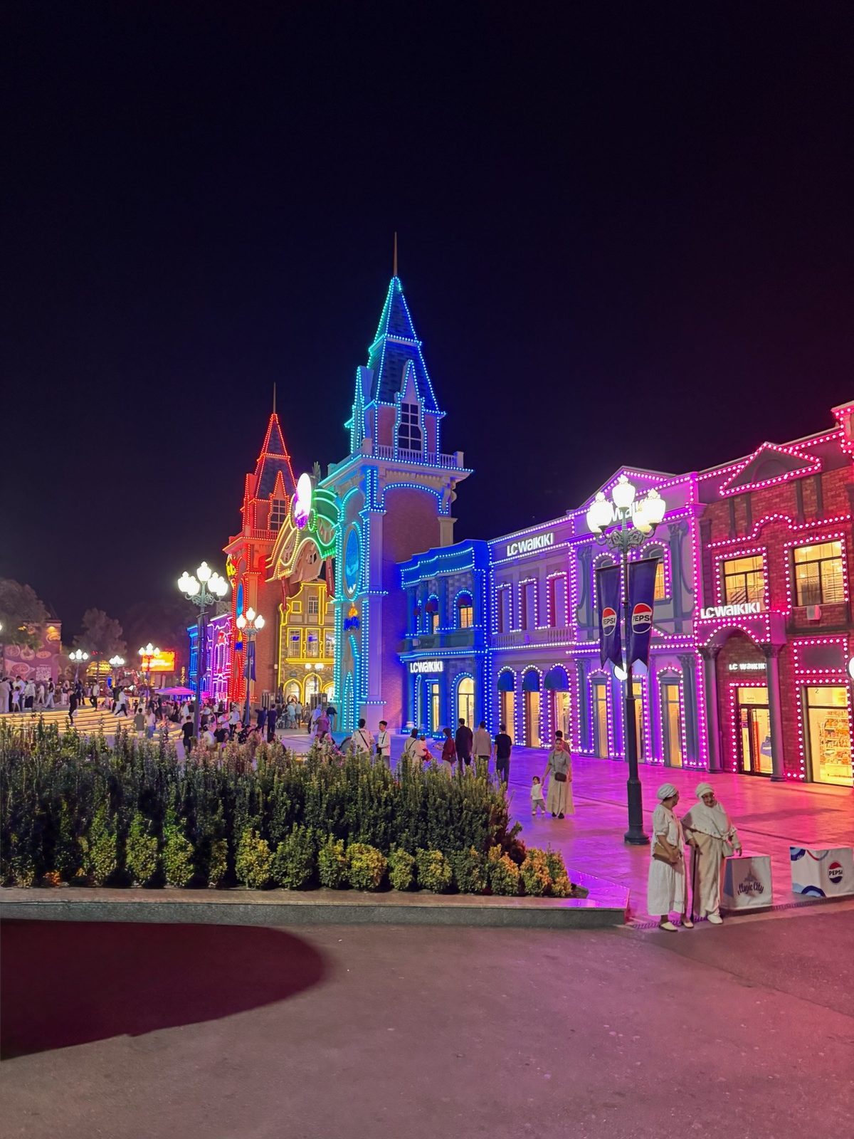 Evening in Tashkent: a lit street in Magic City park