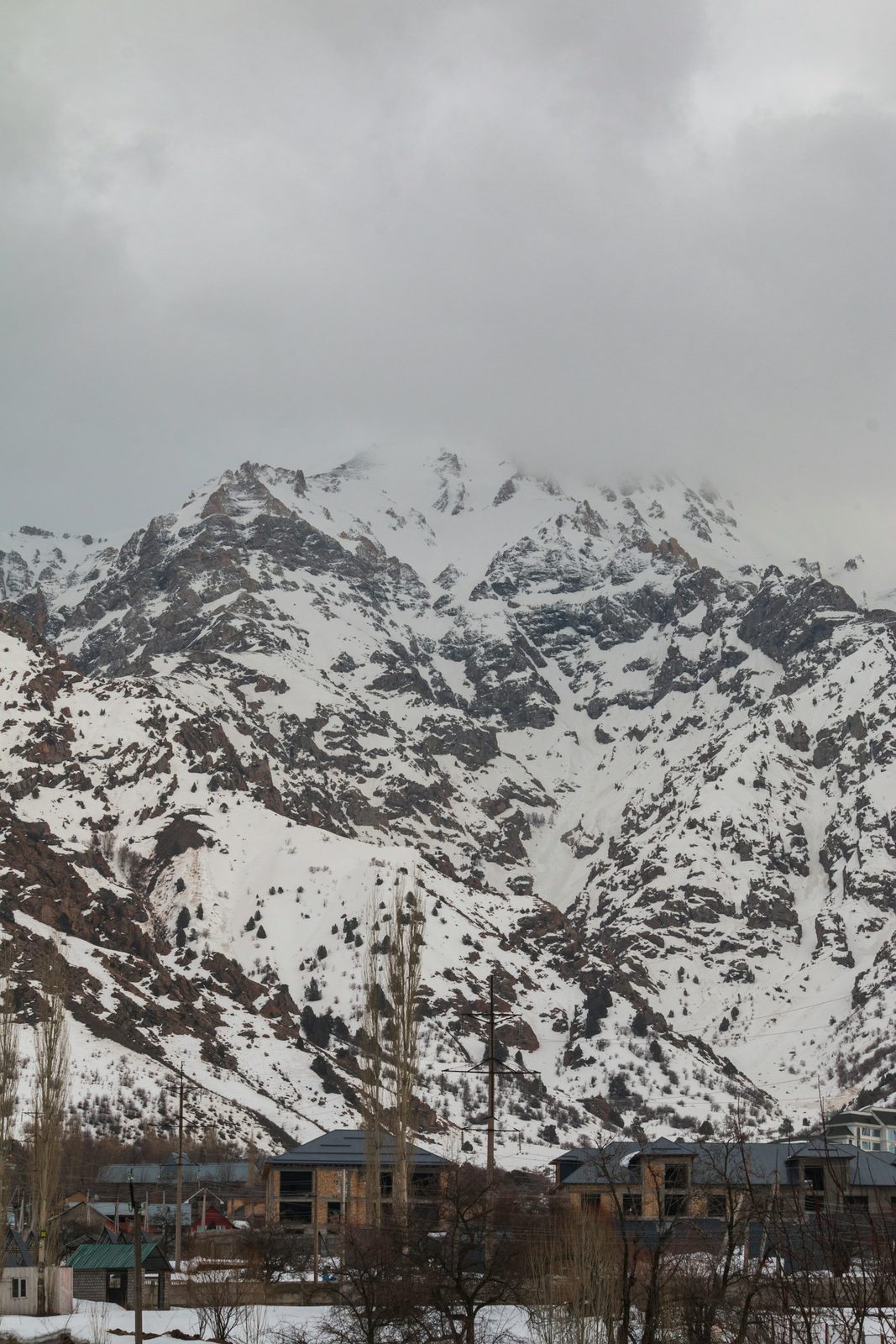 Chimgan in winter: snowy mountains above the village