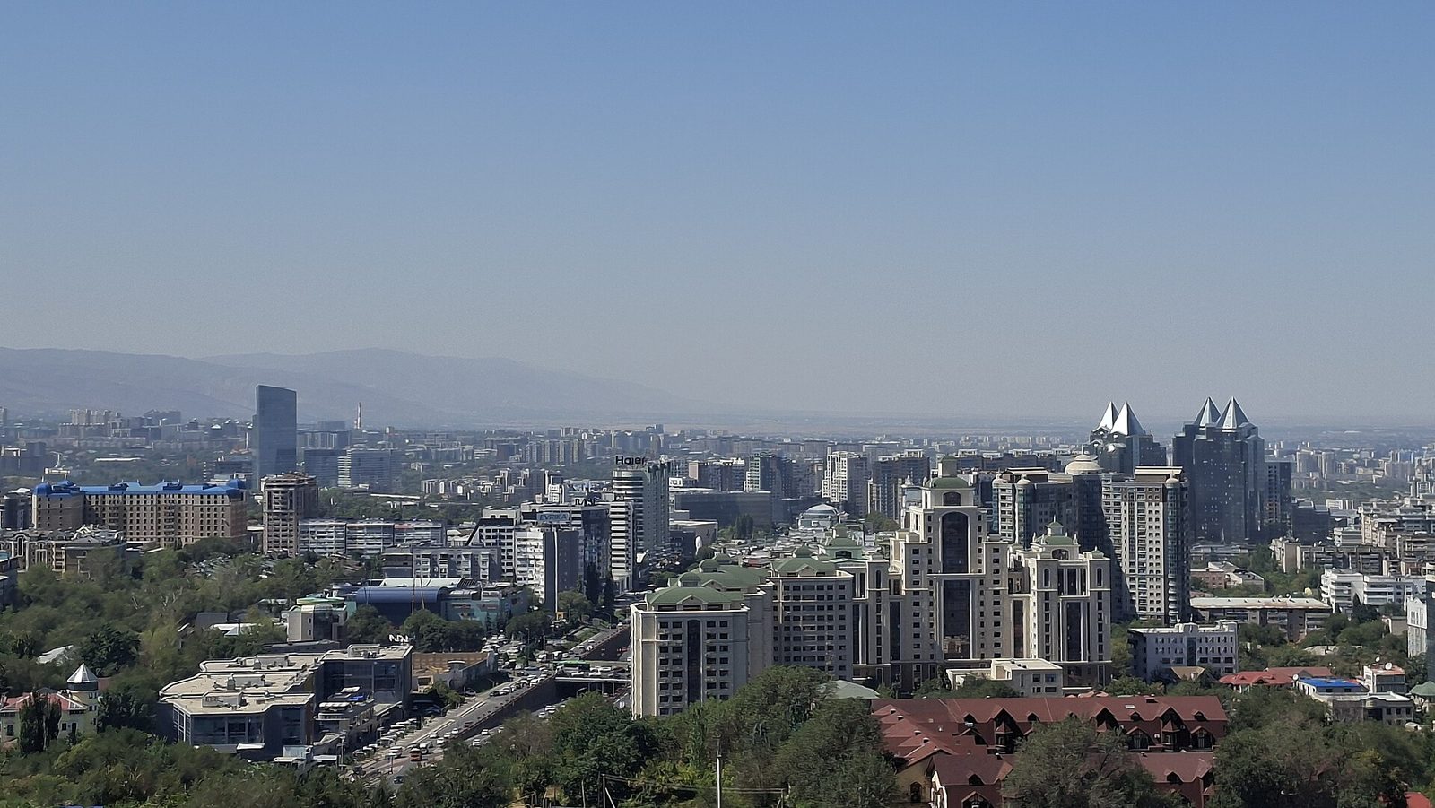 Almaty from Kok-Tobe hill, with the Zailiysky Alatau mountains in the haze