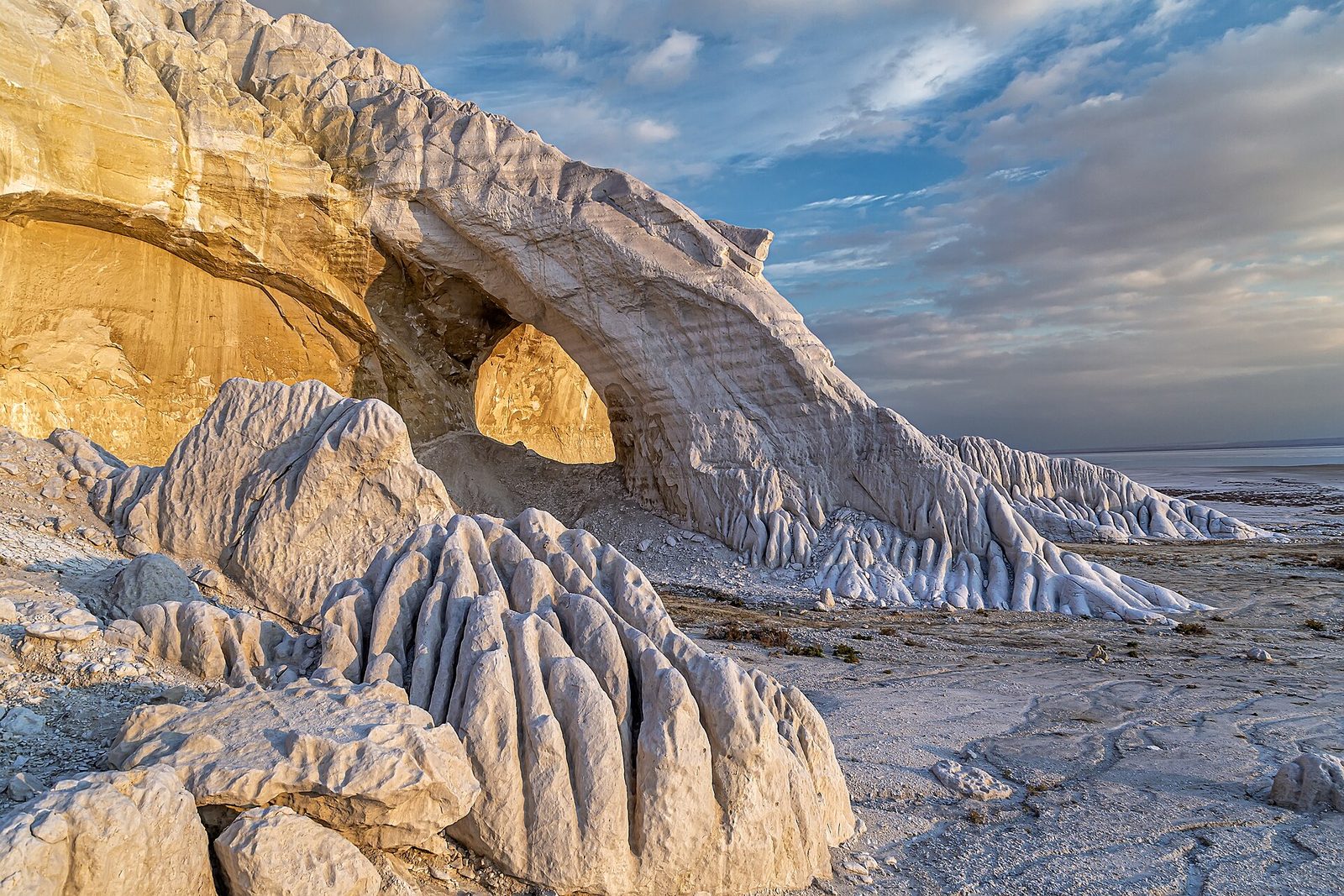 The chalk arch and white cliffs above the Tuzbair salt flat, Mangystau
