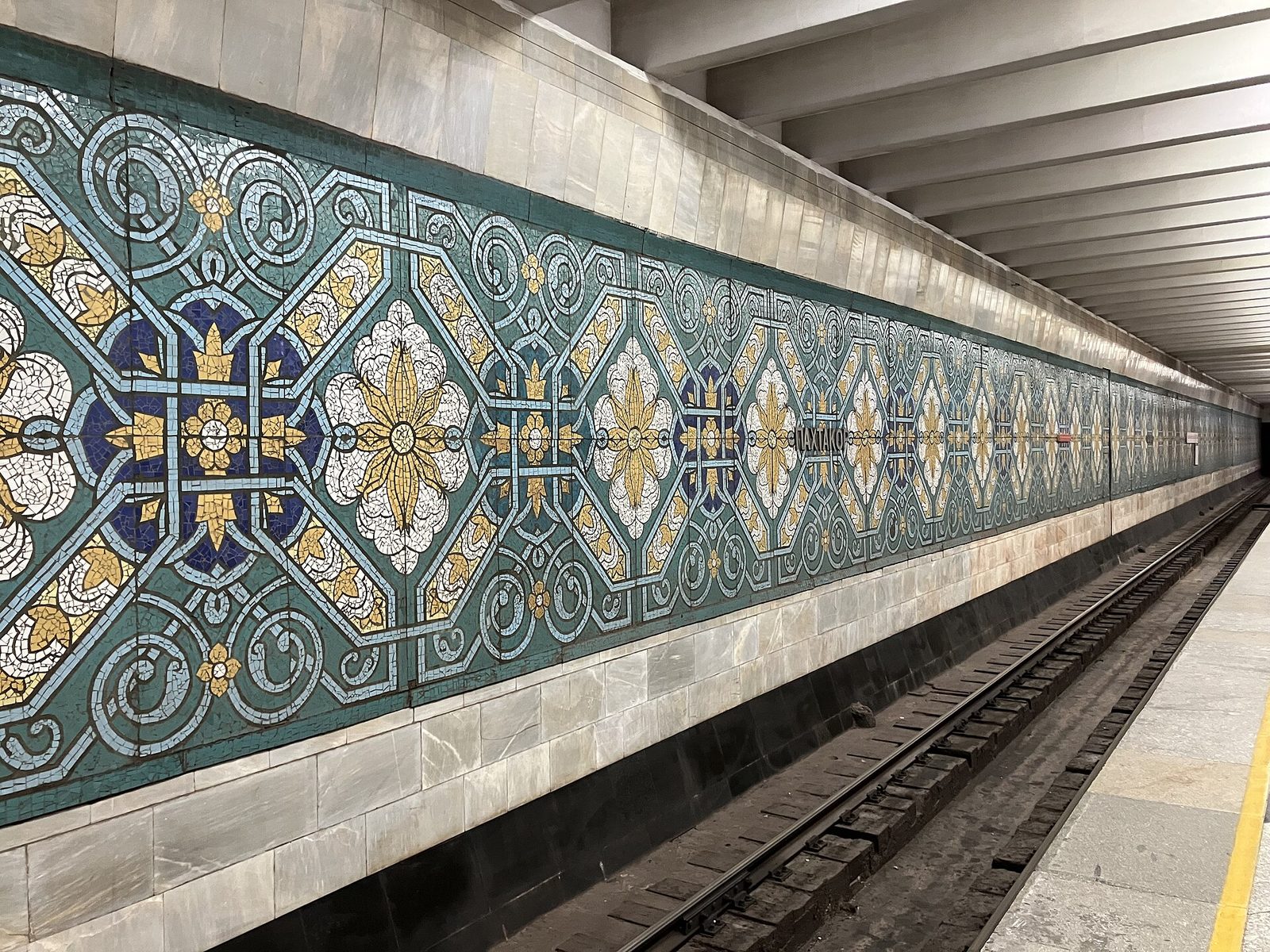 Ceramic ornament along the track wall at Pakhtakor